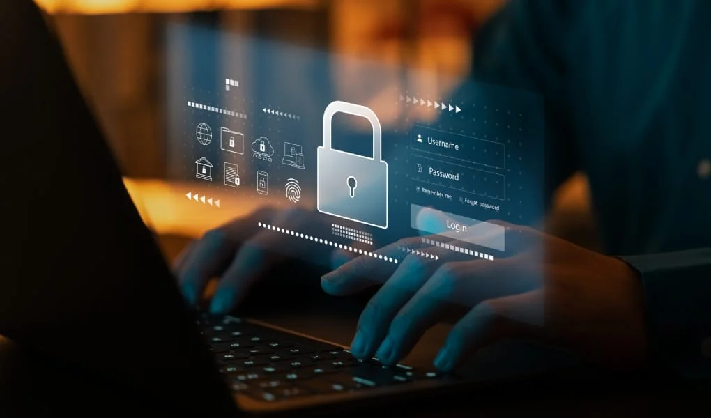 Cyber network security and data protection on the internet, businessman using laptop security encryption with padlock icon Protect your business and financial information from cyberattacks.